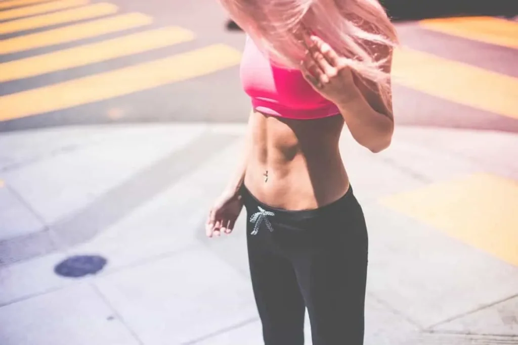 Woman with toned stomach after LA-EMS Body Sculpting Treatment Elstree